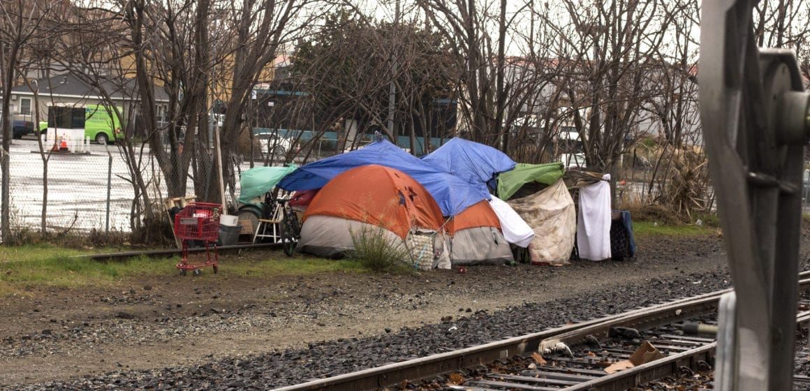 Homeless tents near train tracks