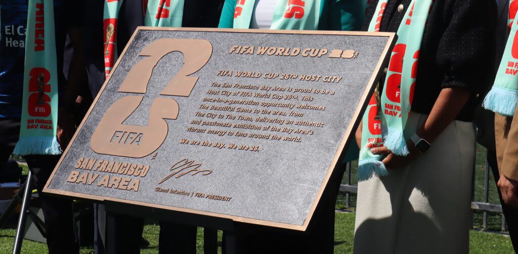 Metal plaque reading "FIFA World Cup 26th Host City"