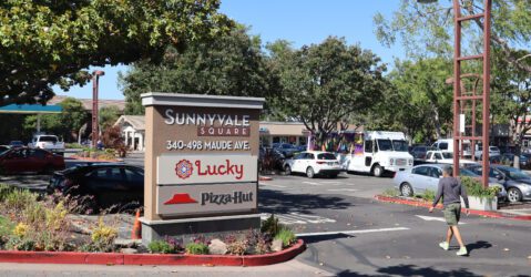 Photo of a parking lot and sign showing the address of Sunnyvale Square, 340-498 Maude Ave, where there's a Lucky Supermarket and Pizza Hut