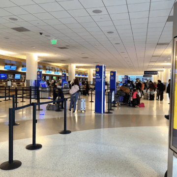 Southwest check-in counter with some passengers waiting but no visible line